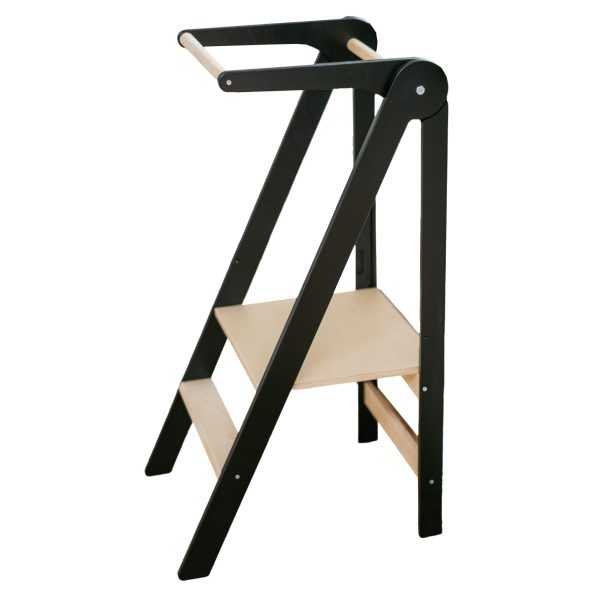 Learning tower adjustable height supports toddlers at the sink.