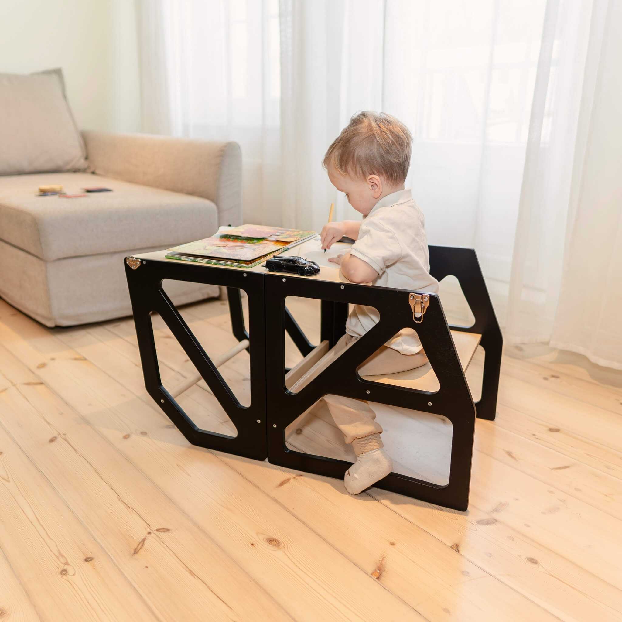 Black transformable kitchen tower in table mode, 2-in-1 toddler furniture solution